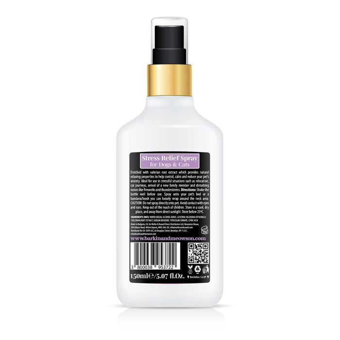 White spray bottle with gold cap on a white background