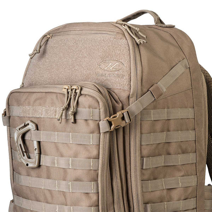 compression straps on highlander 45l coyote brown harrier clamshell pack
