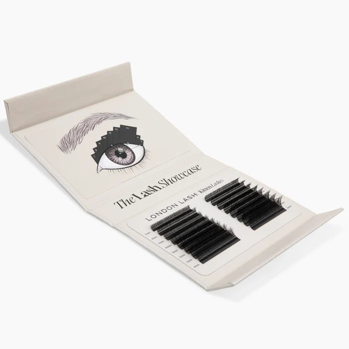 Open lash kit displaying an eye mapping guide alongside two trays of black Kitten Lash extension strips