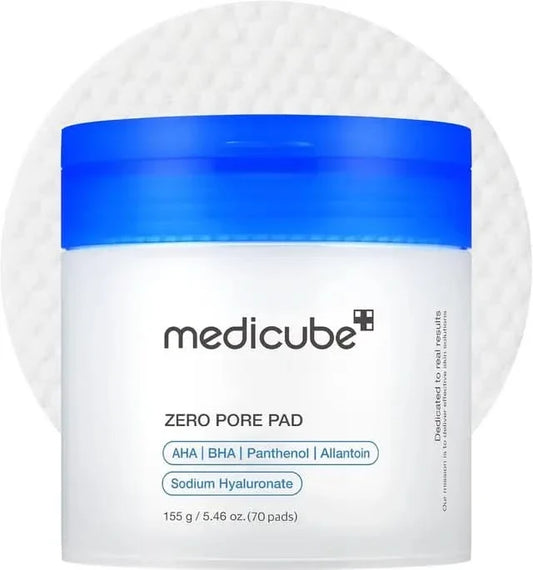 Medicube Zero Pore Pad 2.0 jar with blue lid on white background, labeled AHA, BHA, Panthenol, Allantoin, Sodium Hyaluronate, 70 pads