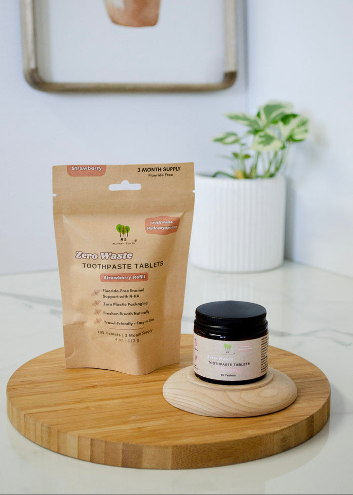 Zero waste toothpaste tablets packaging on a wooden stand with a white background