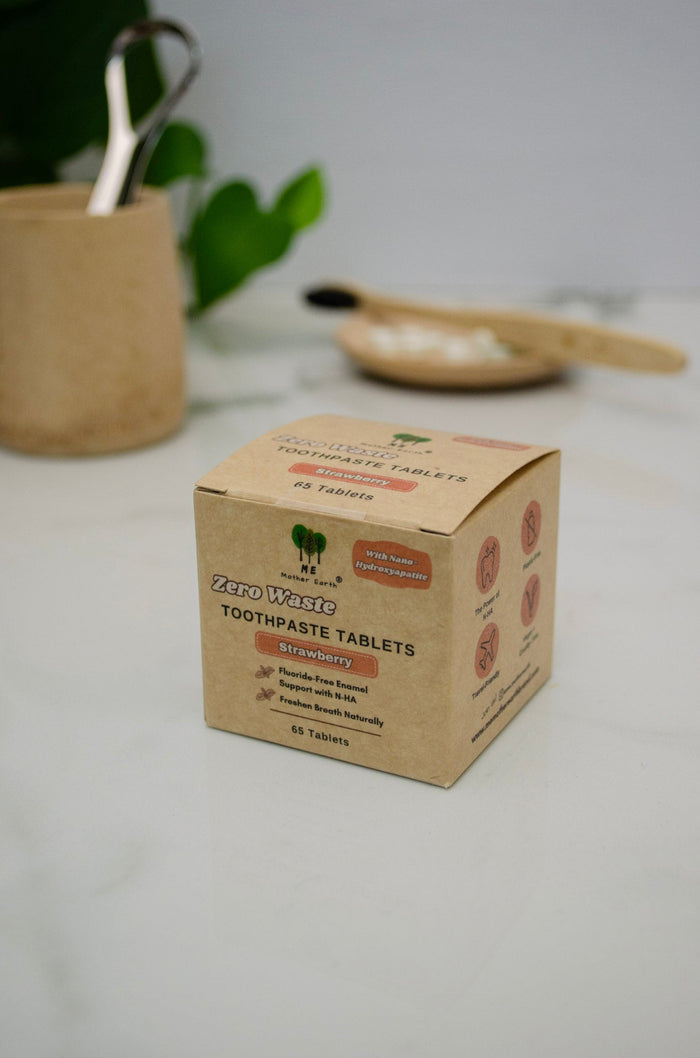 Box of zero waste toothpaste tablets on a light surface with blurred background