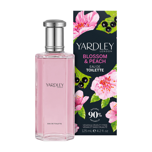 Yardley Blossom & Peach Eau de Toilette 125ml pink glass bottle with silver cap beside dark floral box, white background.